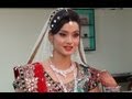 Indian Bridal Makeup And Hairstyle - Off White, Gold And Green Look